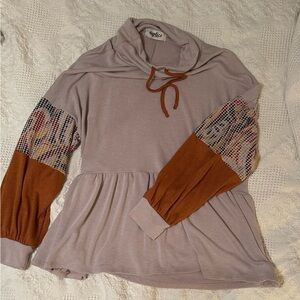 Medium peplum sweatshirt.